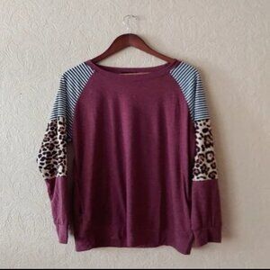 Size S Baseball Style Pullover with burgundy body,  leopard print sleeves